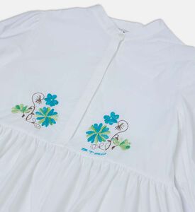 بلوزة مطرزة بأزهار