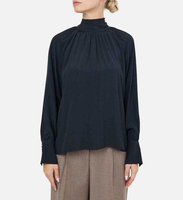 قميص فضفاض بياقة عالية قميص فضفاض بياقة عالية