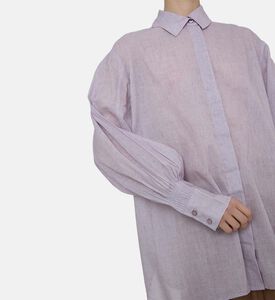 قميص طويل الأكمام شبه شفاف بصف أزرار