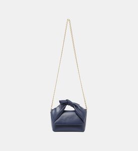 حقيبة تويستر متوسطة الحجم جلد بعقدة مقوسة