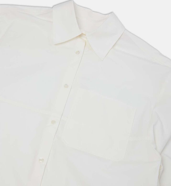 قميص بأكمام طويلة منفوخة بقصة عادية