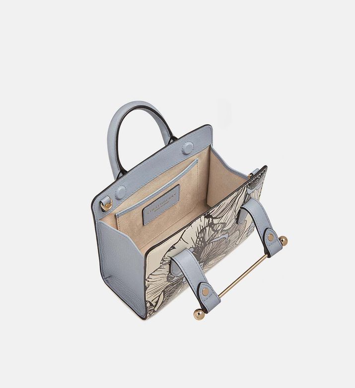 حقيبة يد صغيرة مزينة بنقشة أزهار