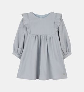 فستان بكشكشة على الأكتاف وأكمام بأساور