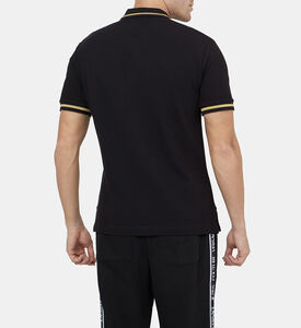 قميص بولو بتطريز ذهبي