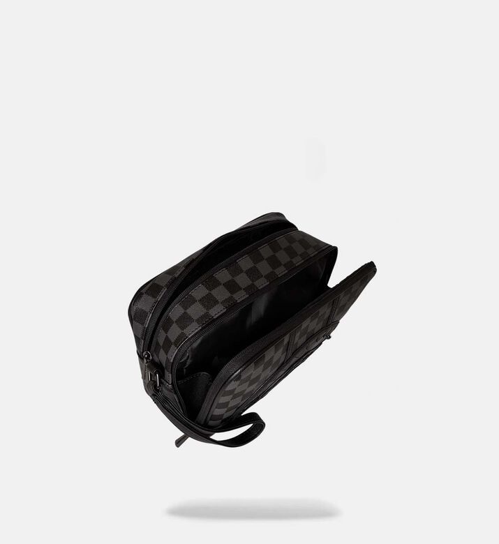 حقيبة صغيرة بنقشة مربعات بأسنان شرسة