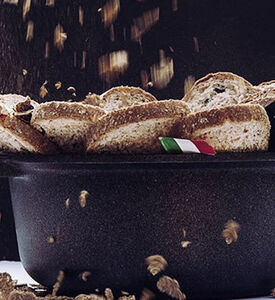 إناء صلصة بغطاء زجاجي ومقبضين