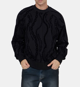 سويت شيرت بقصّة فضفاضة بتصميم سلسلة