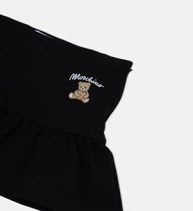 تنورة بخصر مطاطي وطبقات دانتيل مزينة بطبعة دب تيدي