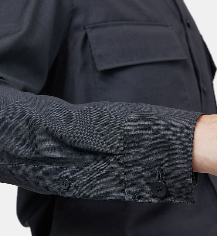 قميص بجيبين وغطاء قلاب