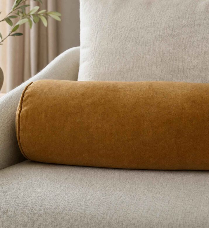 Home Deco and More Odette Velvet Bolster Cushion, Brown, Model View