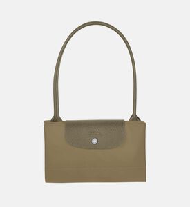 حقيبة يد كبيرة مطرزة بشعار العلامة