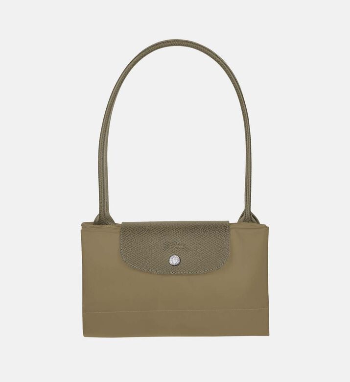 حقيبة يد كبيرة مطرزة بشعار العلامة