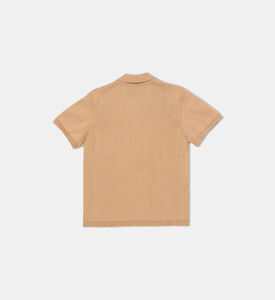 قميص بولو بأكمام قصيرة مخططة وأساور مضلع