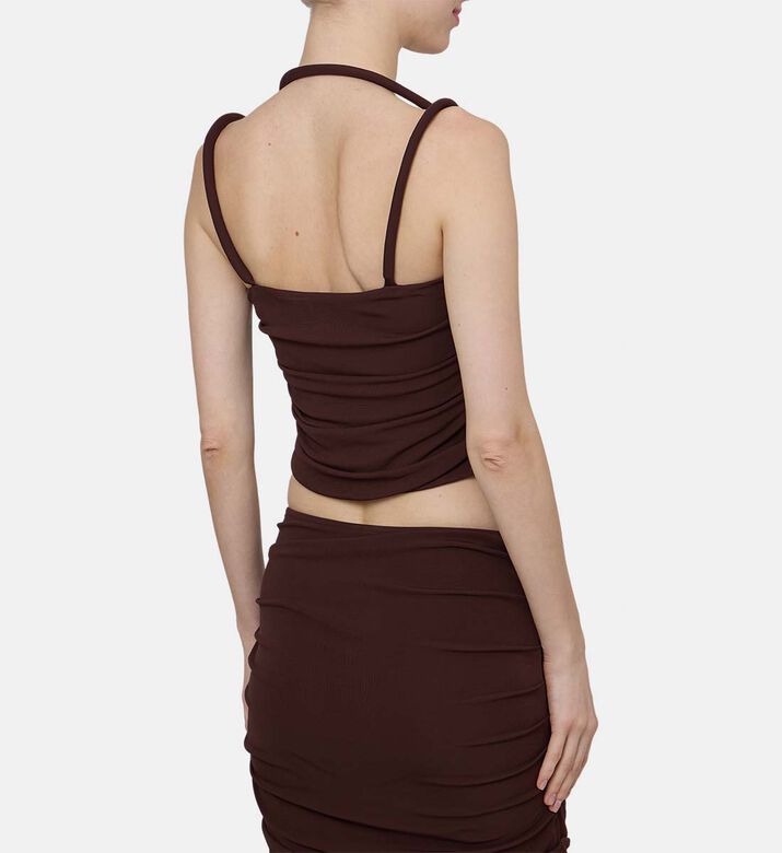 بلوزة مجمعة بأشرطة مزينة بعقد