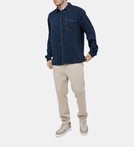 قميص بأكمام طويلة بجيب صدر دنيم