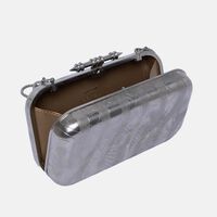 The Sahra Brass Golden Clutch