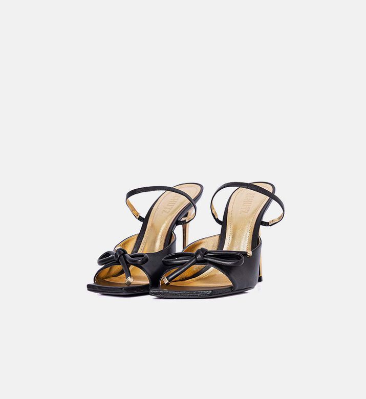 حذاء مفتوح من الخلف منحوت بسير خلفي