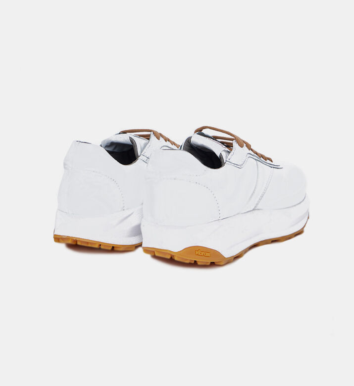 حذاء رياضي جلدي مخطط بلوغو