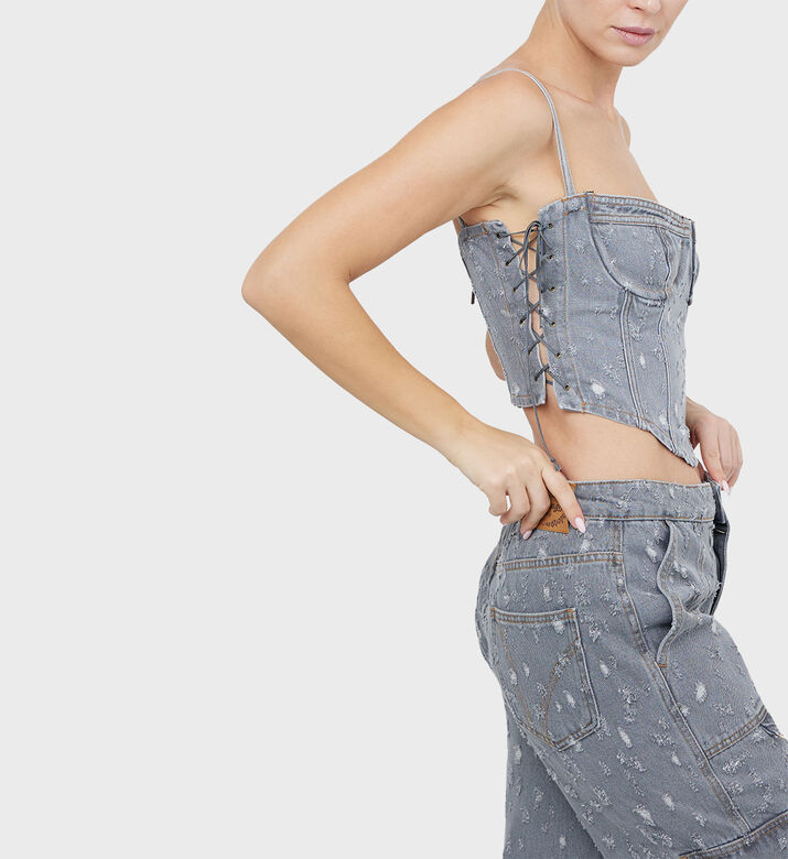 تدمير مشد الدنيم المتوترة