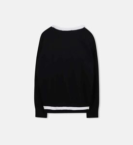 سترة محبوكة بخطوط متباينة