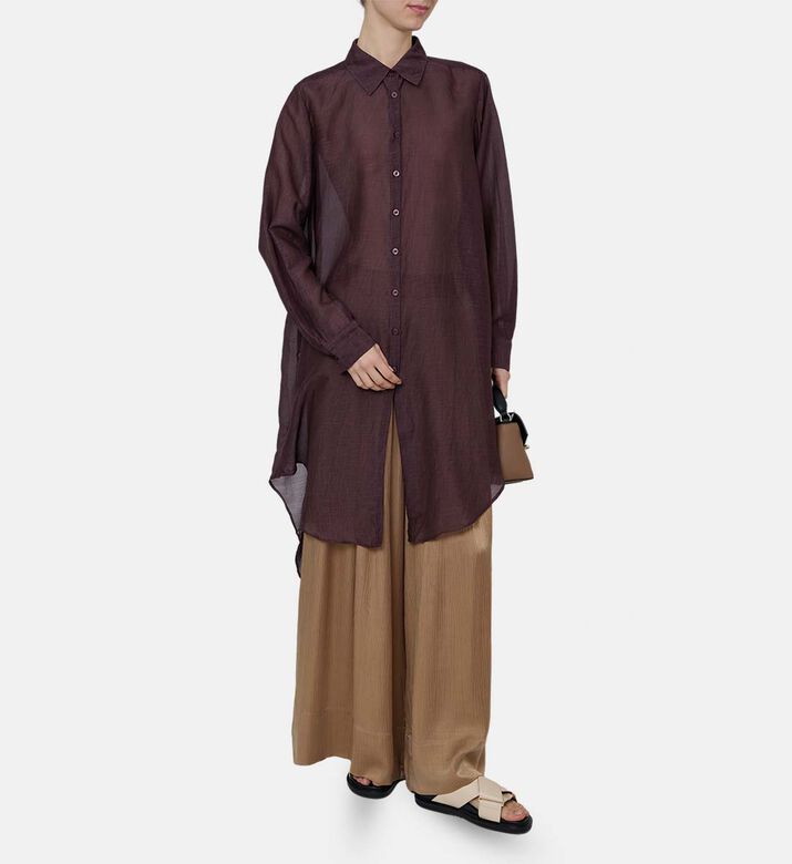 قميص شفاف بأكمام طويلة وصف أزرار