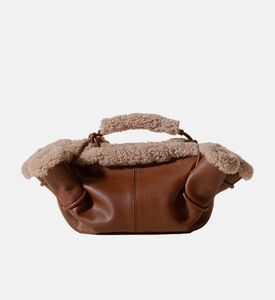 حقيبة يد أرتا صغيرة بفرو غنم مجعد