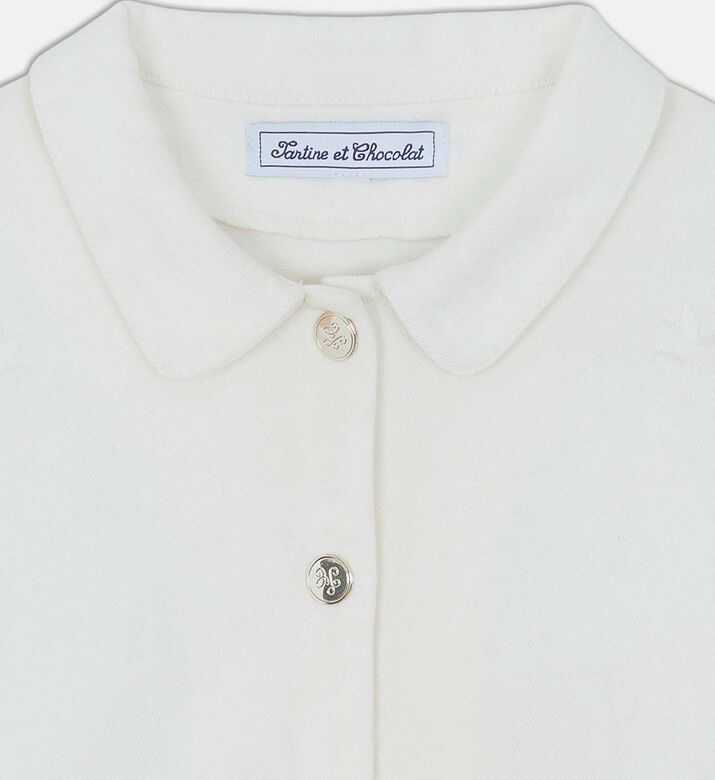 جاكيت مطرز بأزهار بلون موحد جاكيت مطرز بأزهار بلون موحد