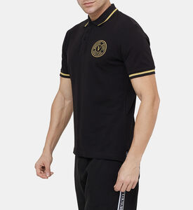 قميص بولو بتطريز ذهبي