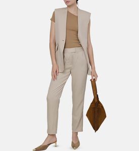 تيشيرت غير متماثل بتفاصيل أزرار ذهبية