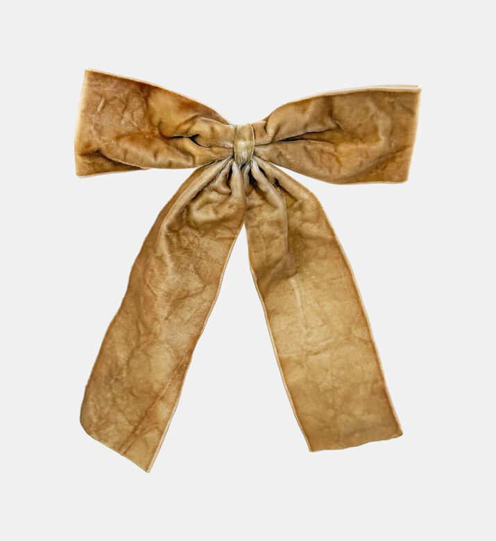 مشبك بشكل عقدة مخملية