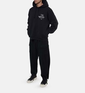 هودي فضفاض مضلع بطبعة شعار