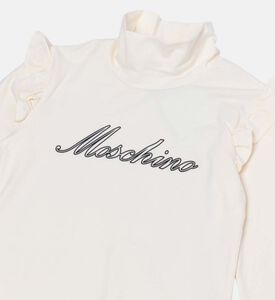 فتاة قميص الياقة المدورة تكدرت