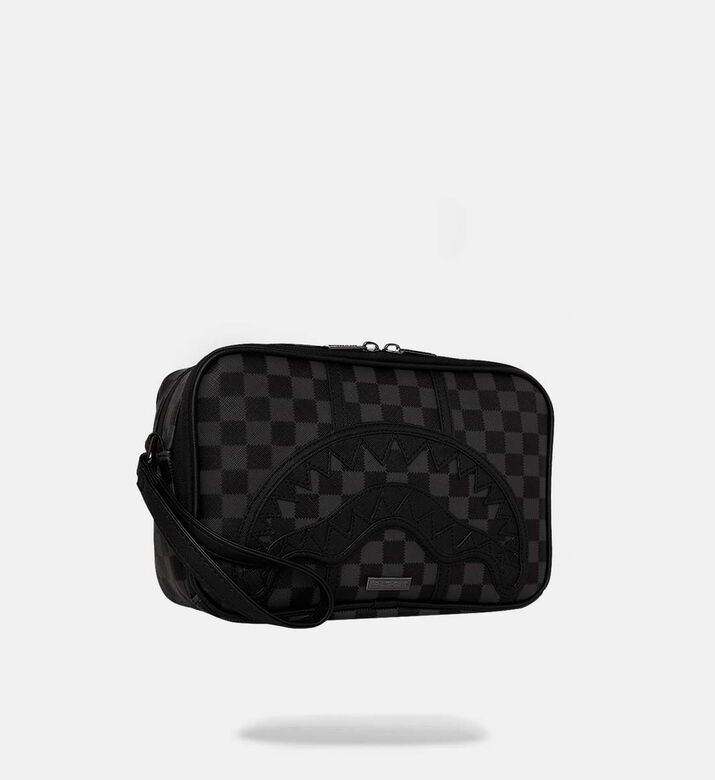 حقيبة صغيرة بنقشة مربعات بأسنان شرسة