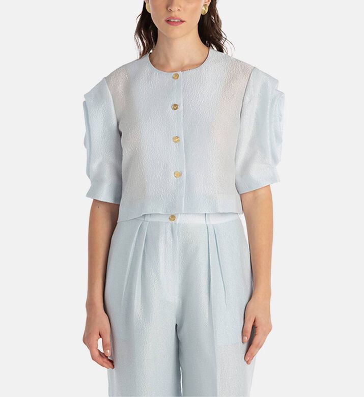 بلوزة بأكمام درابيه بشكل أزهار