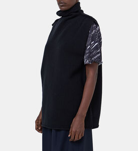 بلوزة بدون أكمام بياقة عالية