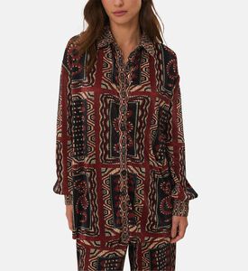 قميص بطيات بأوشحة أفعى