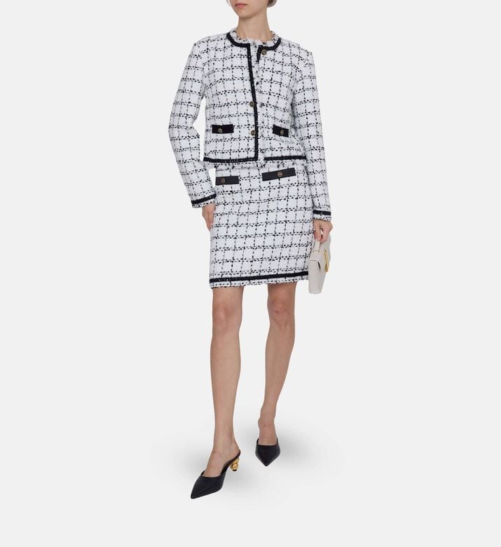 تنورة قصيرة بنقشة مربعات تنورة قصيرة بنقشة مربعات