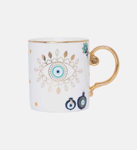 كوب بمقبض ذهبي بشكل عين شريرة