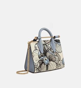 حقيبة يد صغيرة مزينة بنقشة أزهار