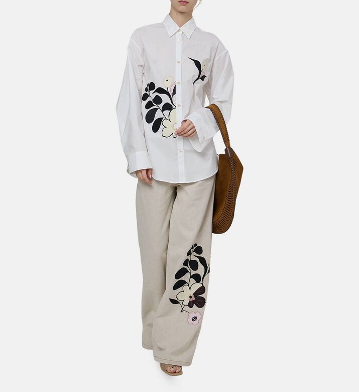 بنطال دنيم مطرز بأزهار