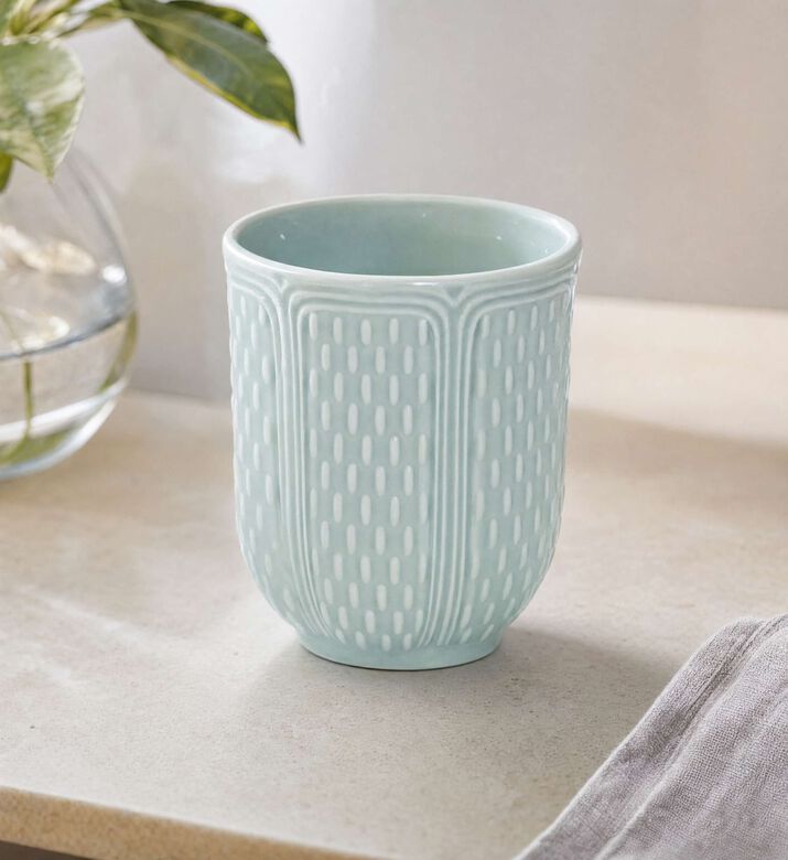 Gien Celadon Embossed Tea Cup, Model View