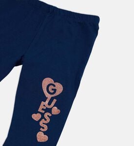 بنطال بقصة عادية وتطريز شعار