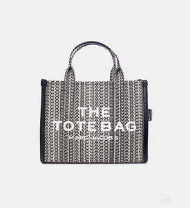 حقيبة مونوغرام متوسطة الحجم