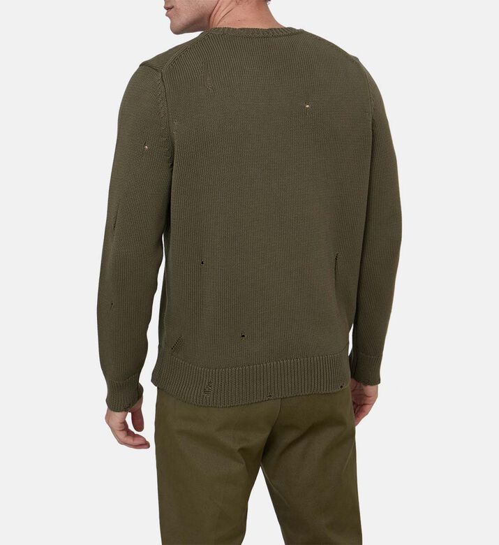 سترة محبوكة طويلة الأكمام ومثقبة