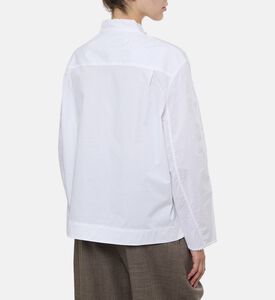 بلوزة يونانية مزينة بحلقات مفرغة