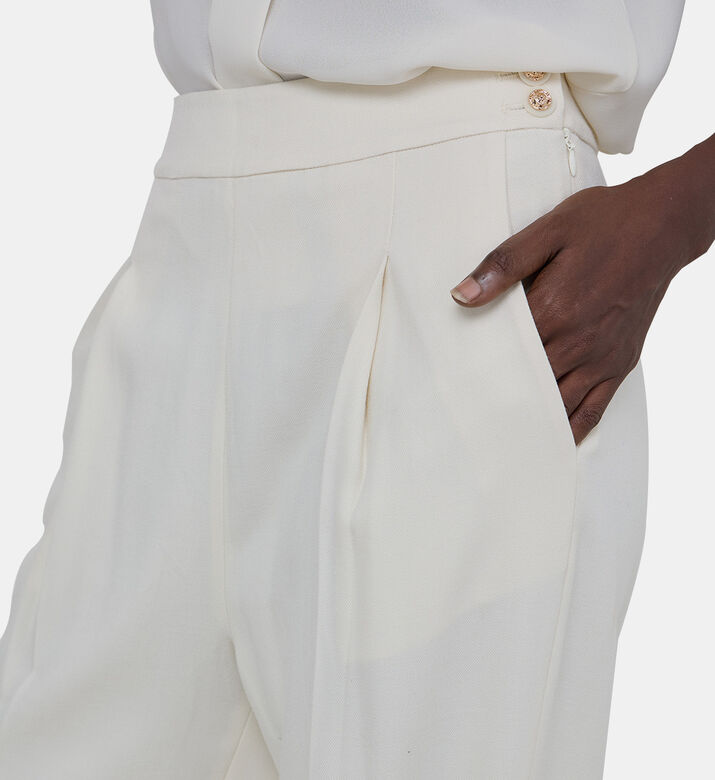 بنطال بثنيات عريض الساقين