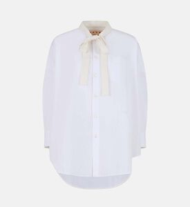 قميص بأكمام طويلة وتفصيل عقدة