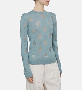 كنزة محبوكة بياقة دائرية وتفاصيل مثقبة