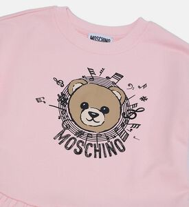 فستان طويل الأكمام بقصّة هرمية بطبعة دب تيدي وشعار