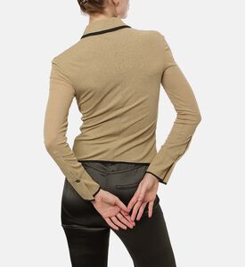 قميص بأكمام طويلة وإغلاق بأزرار